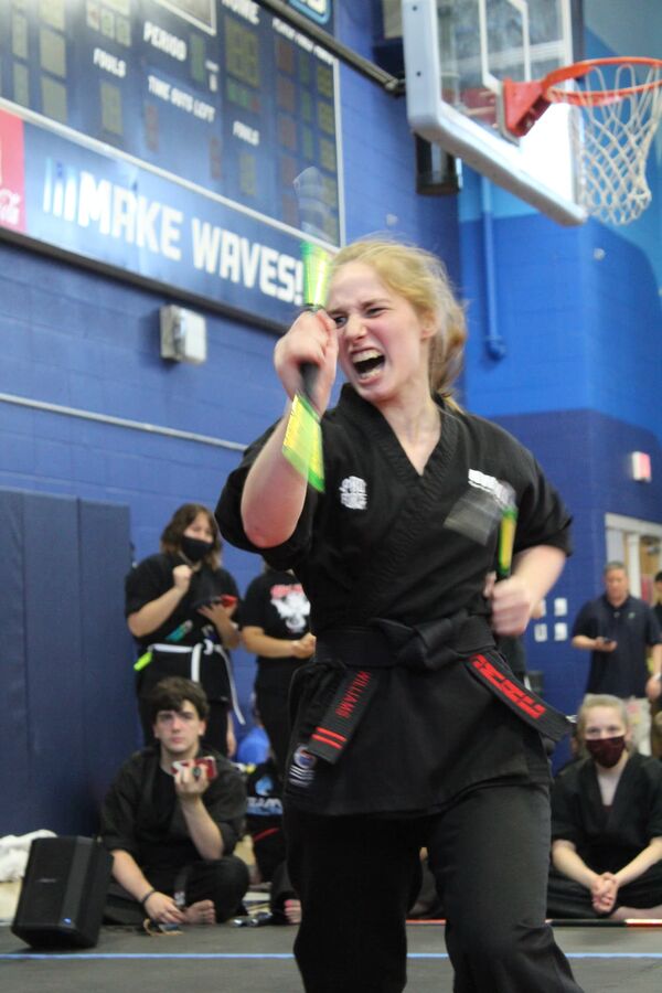 Karate competitor performing at a tournament