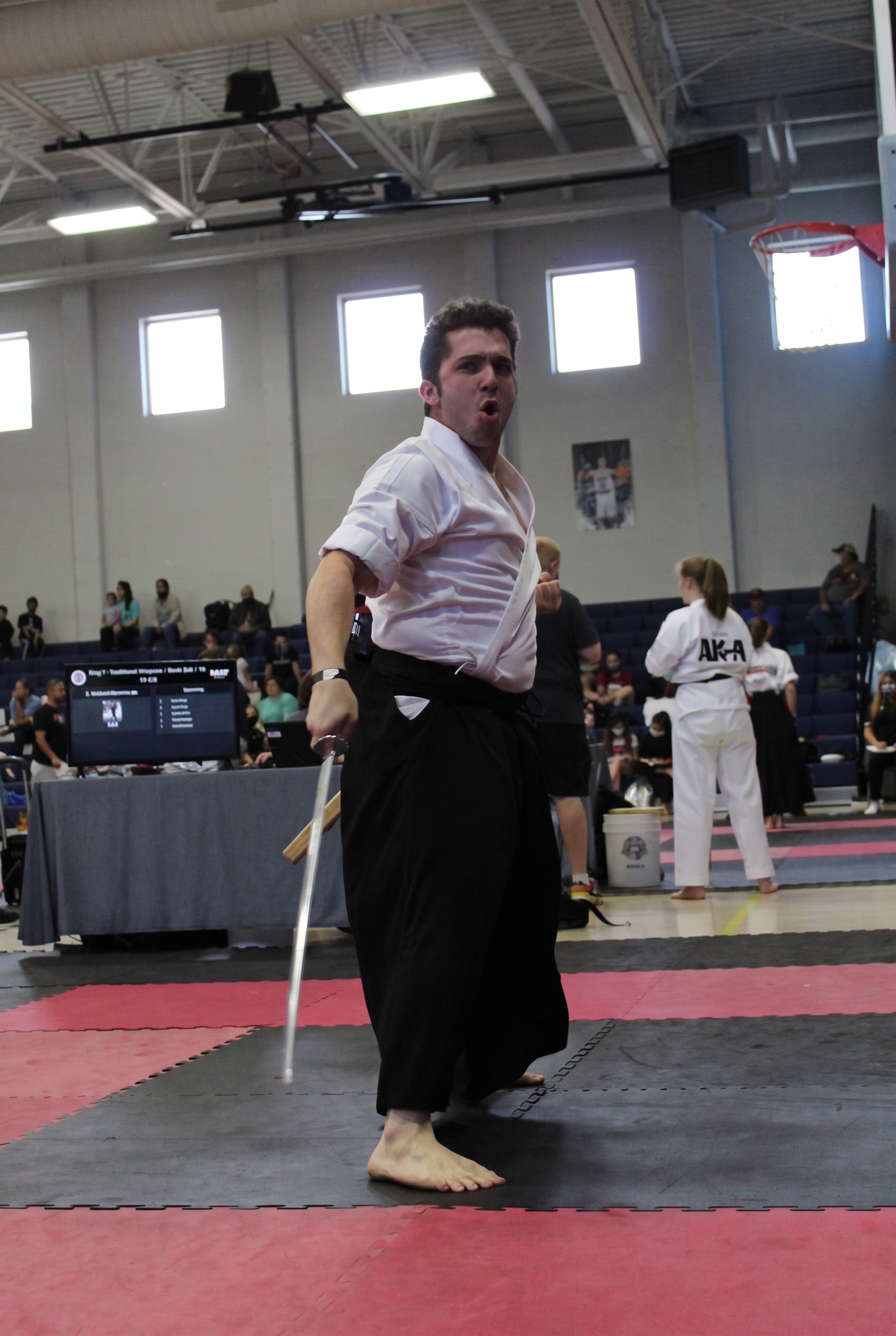 Karate competitor performing at a tournament